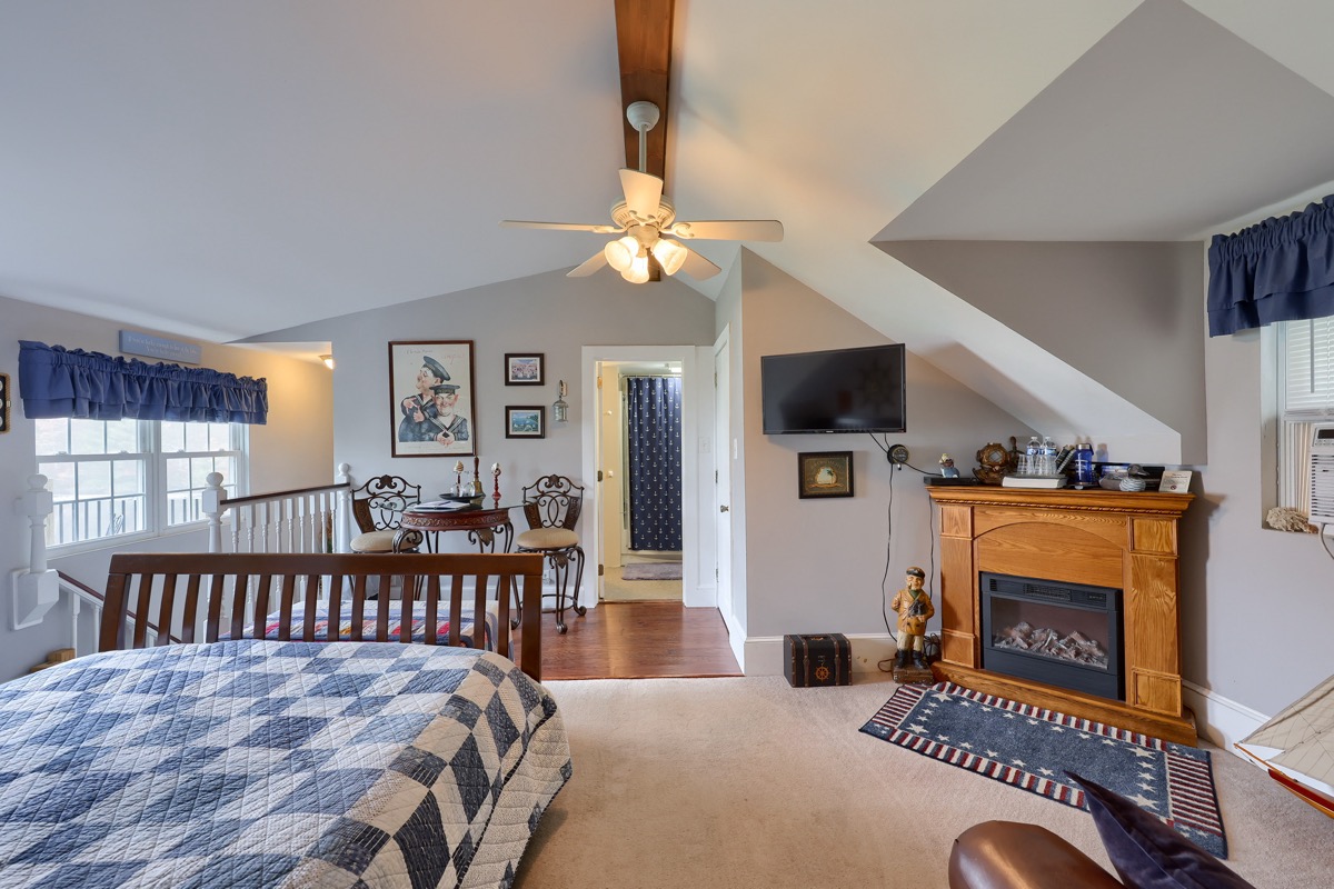 The Nautica Room - fireplace and sitting area